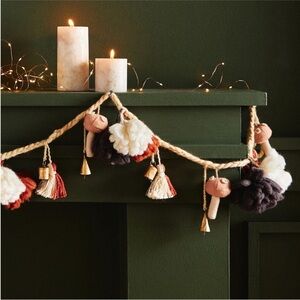 Anthropologie Festive Pom Garland with bells and mushrooms
